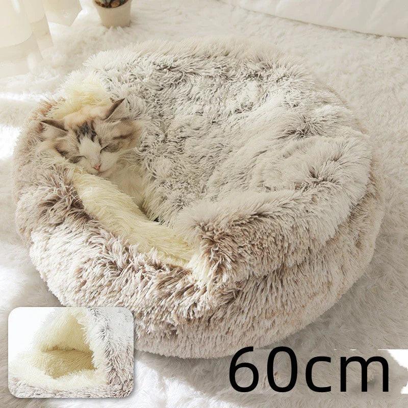 Fluffy round pet bed with a sleeping cat, beige faux fur, 60cm size, on a soft rug
