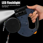 Hand holding retractable dog leash with built-in LED flashlight for night walking