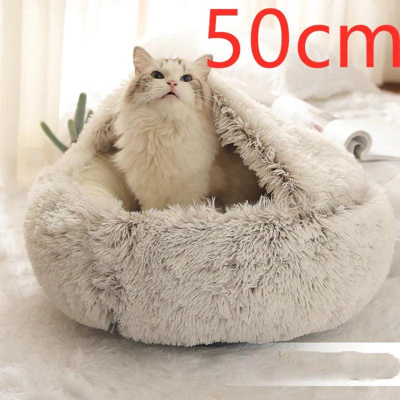 Cat sitting in a soft plush pet bed, 50cm size, cozy indoor setting
