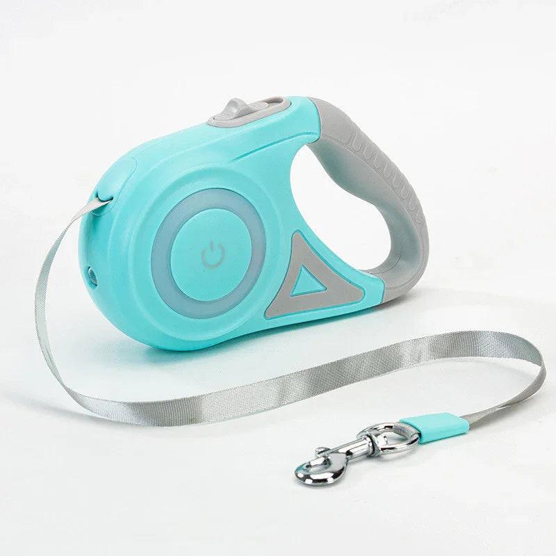 Retractable blue dog leash with gray handle and silver clip on white background