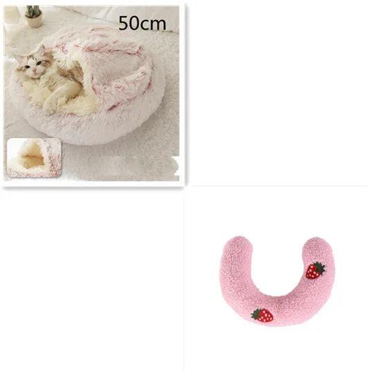 Soft pink covered cat bed with fluffy texture, cat inside, and matching strawberry neck pillow.