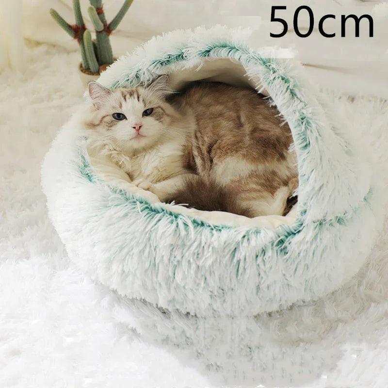 Fluffy cat lounging in a cozy round white pet bed, 50cm size, on soft white carpet.