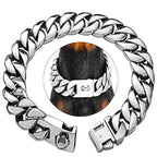 Stainless steel wide metal dog collar on a dog's neck, strong Cuban link design