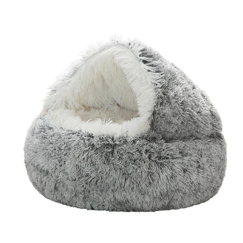 Cozy grey faux fur covered pet bed with a soft, cave-shaped design for cats and small dogs