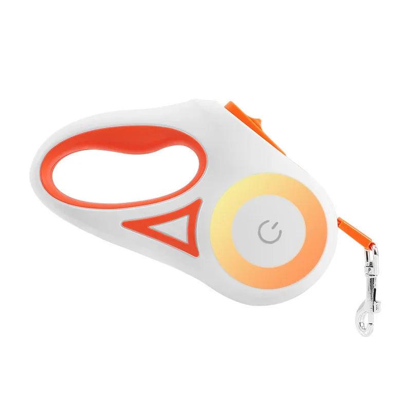 White and orange retractable dog leash with ergonomic handle and LED light