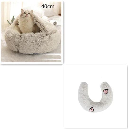 Fluffy white cat in a soft, round cozy cat bed with heart detail, 40cm size.