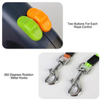 Dual retractable dog leash with two colored buttons and 360-degree rotating metal hooks