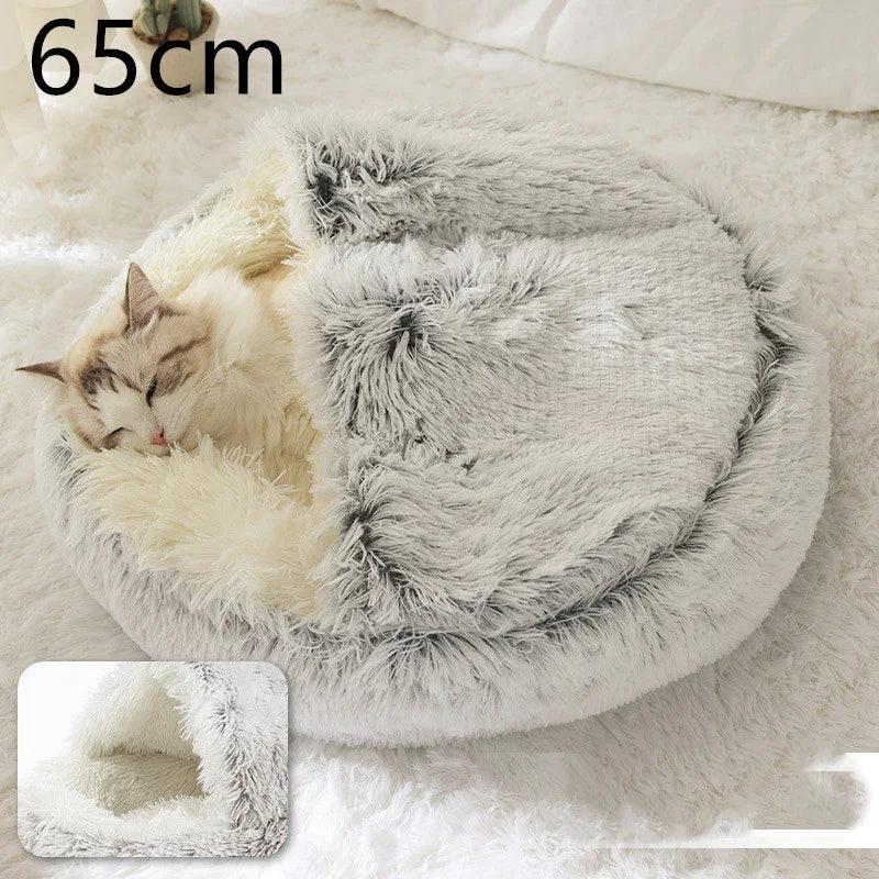 Cat sleeping in a fluffy grey covered pet bed, cozy indoor cat bed 65cm
