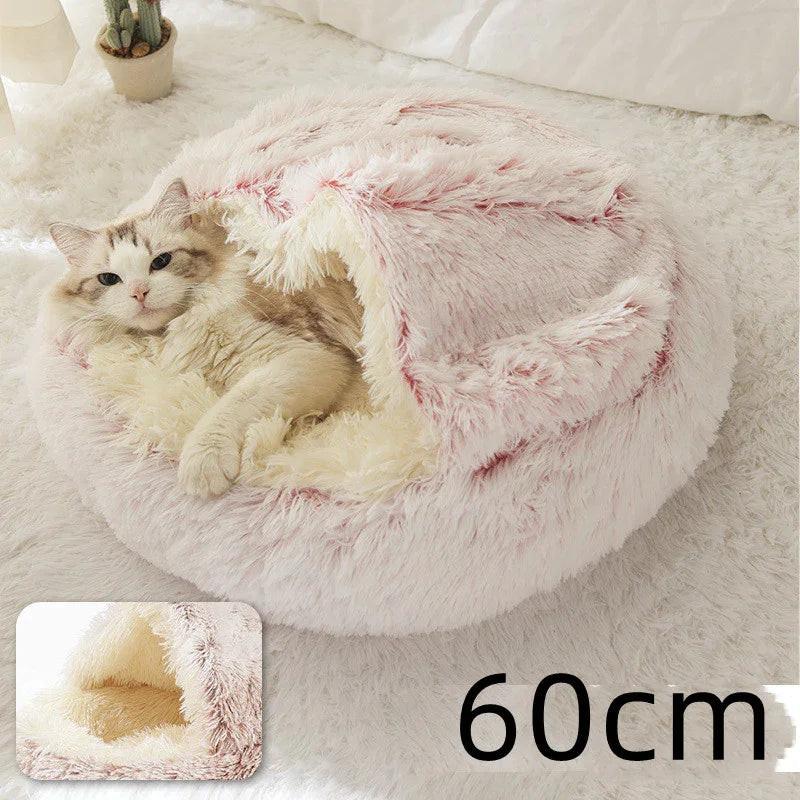 Cat lounging in a fluffy pink and cream pet bed with hood, cozy indoor setting, 60cm size