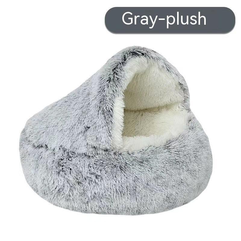 Gray plush covered pet cave bed with soft white interior, perfect for cats or small dogs