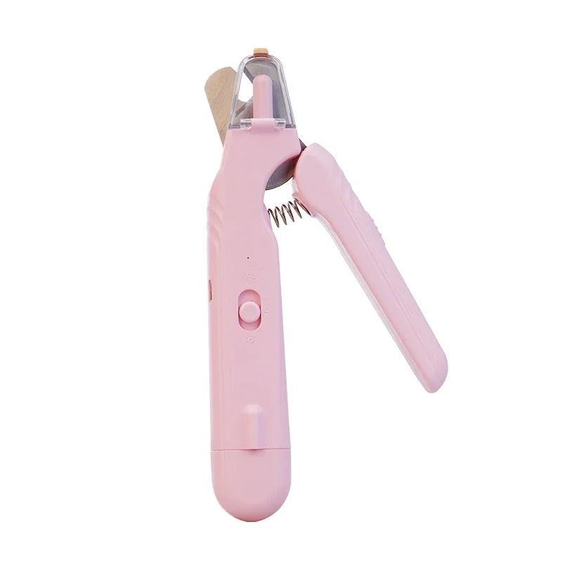 Pink pet nail clipper with safety guard and LED light for dog or cat grooming