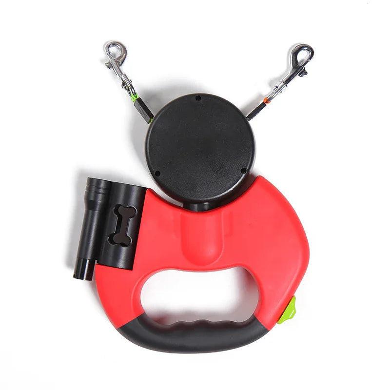 Dual retractable dog leash with waste bag holder and flashlight, red handle