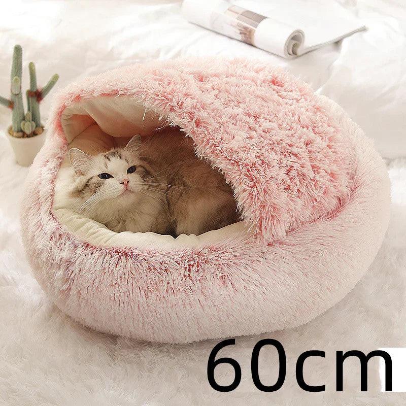 Fluffy white cat in a pink hooded pet bed, cozy indoor cat cave, size 60cm.