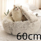 Fluffy white cat in a cozy, round 60cm plush pet bed on a soft indoor surface
